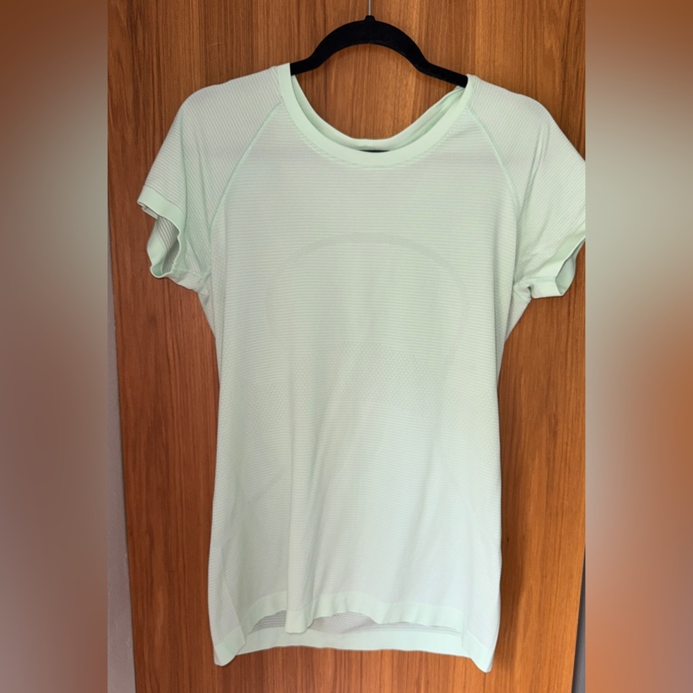 Lululemon Swiftly Tech Short-Sleeve Shirt 2.0
Hip Length. Size 12. Mint Green